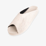 Indosole Women's Pable Wabi slide in awan cream — three-quarter view showing knit upper