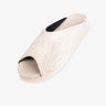 Indosole Women's Pable Wabi slide in awan cream — three-quarter view showing knit upper