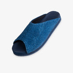 Pable Wabi slider in indigo — three-quarter view showing blue knit upper on navy sole
