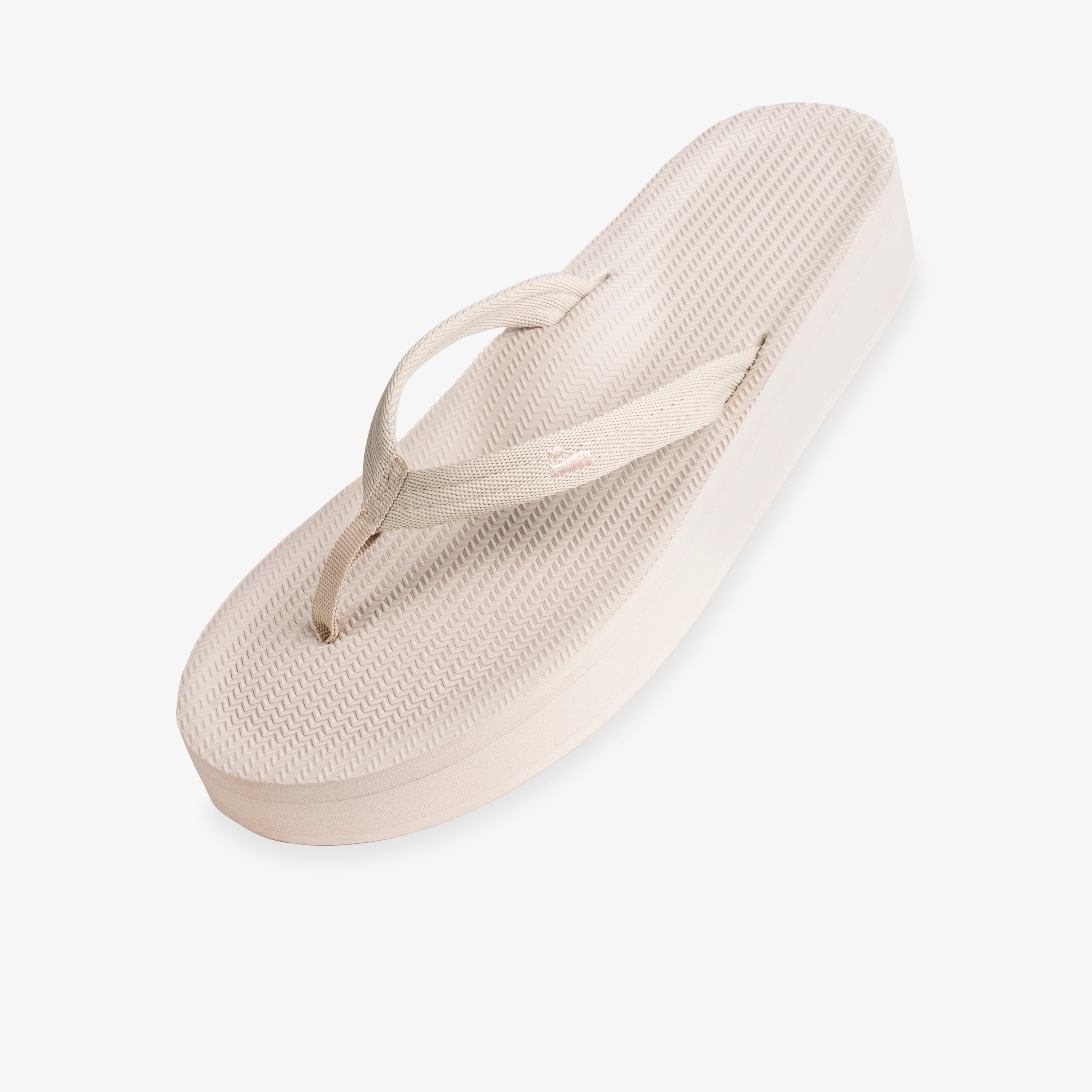 Indosole Women's Easy Living platform flip flop in sea salt cream — three-quarter view