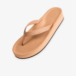 Easy Living soil light platform flip flop — three-quarter view showing tan elevated sole