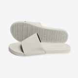 Stacked view of sea salt slides showing herringbone sole pattern and cream upper