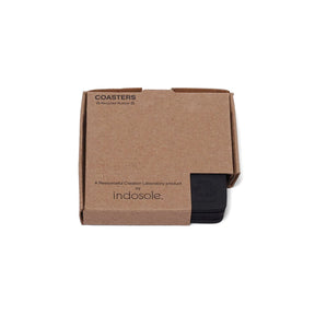 Recycled rubber coasters by Indosole